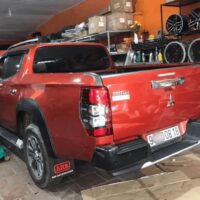 Nắp thùng cuộn điện Option xe Mitsubishi Triton rất cần thiết ngày nay